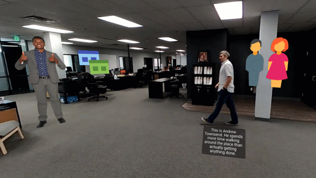 Man walking through an office followed by a text box